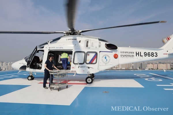 회진을 도는 중 닥터헬기가 떠야 하는 상황이 발생했다